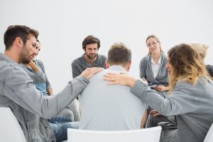 People with bipolar disorder gather for a group therapy session